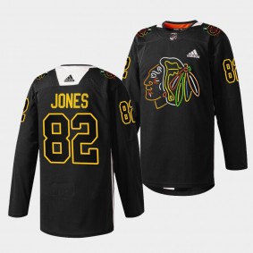 Caleb Jones Blackhawks #82 Foundation Night Jersey Black Warm-Up